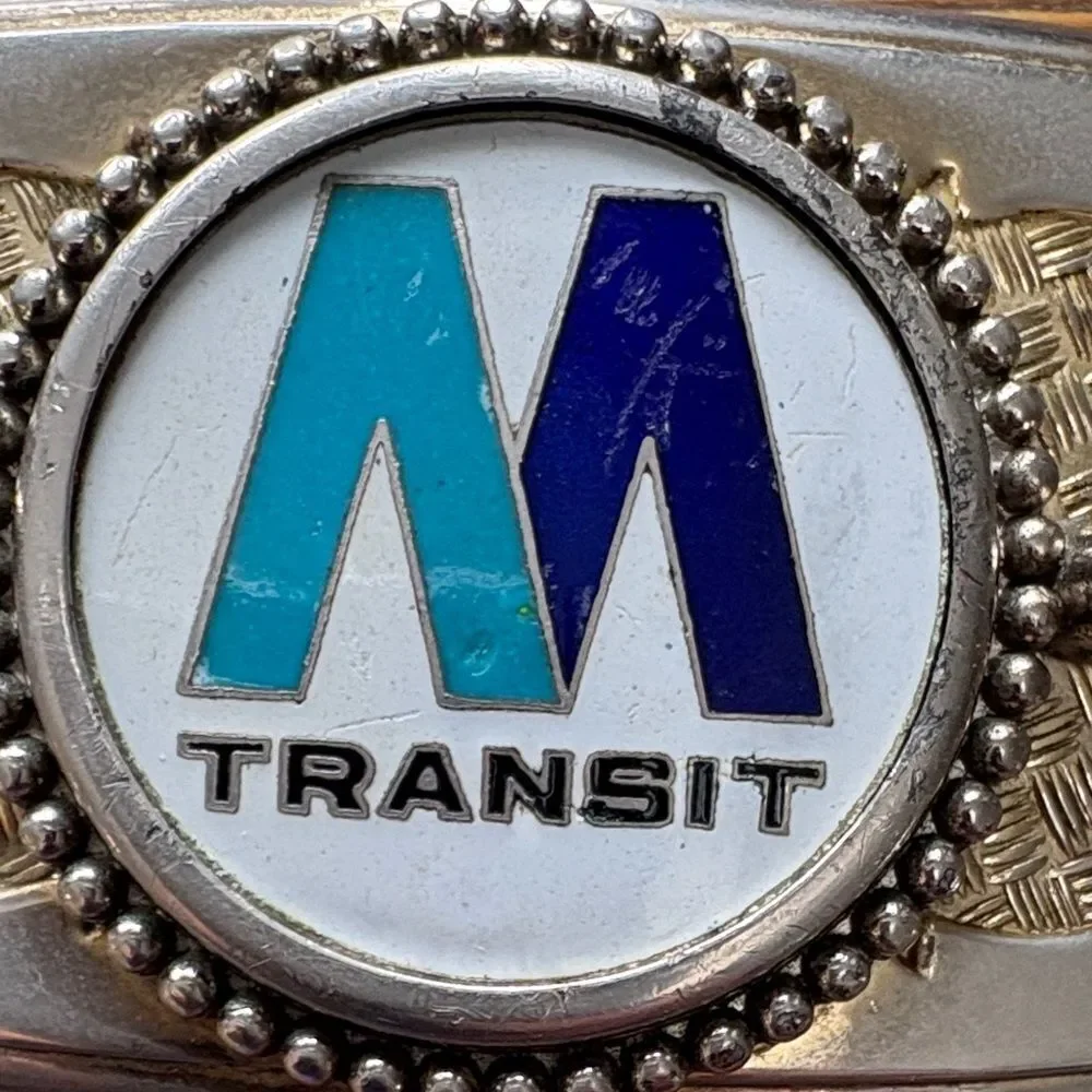 Vintage M Transit Logo Silver and Blue Belt Buckle